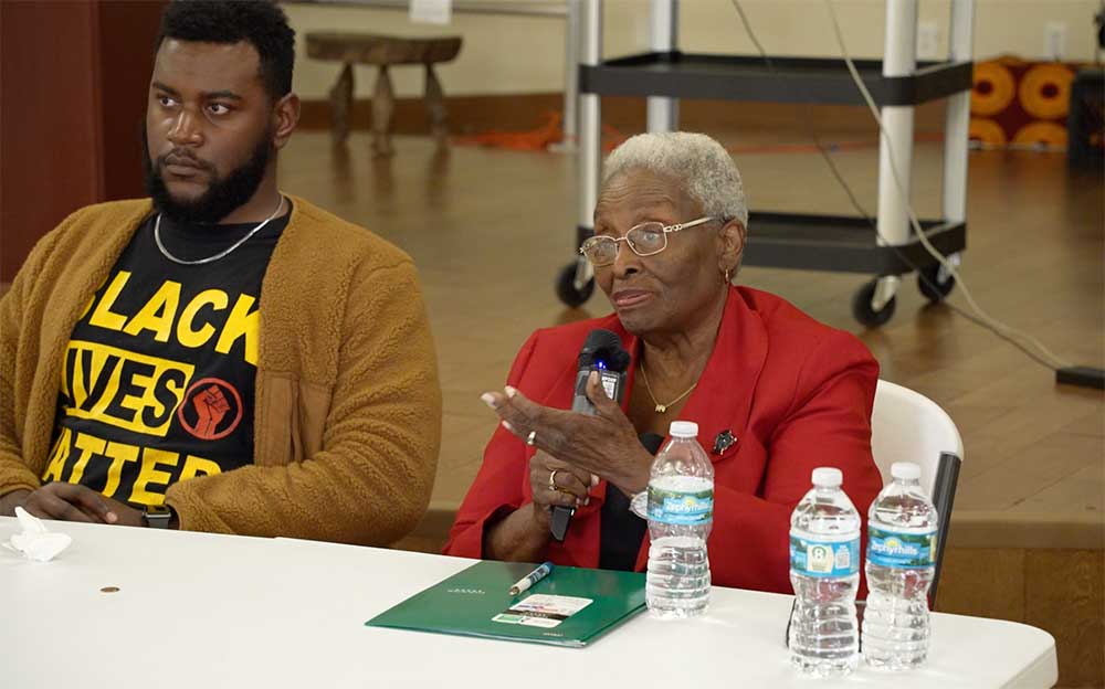African American Man and Woman at a panel table